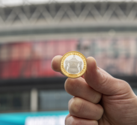 Commemorative £2 coin celebrating 150 Years of the FA Cup